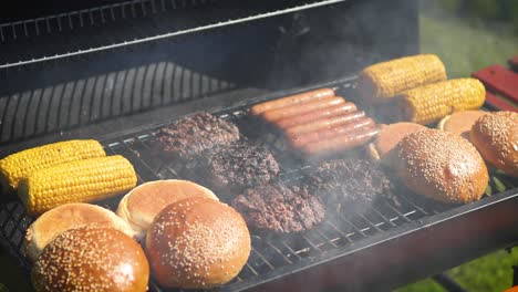 mixed american barbecue food on hot grill