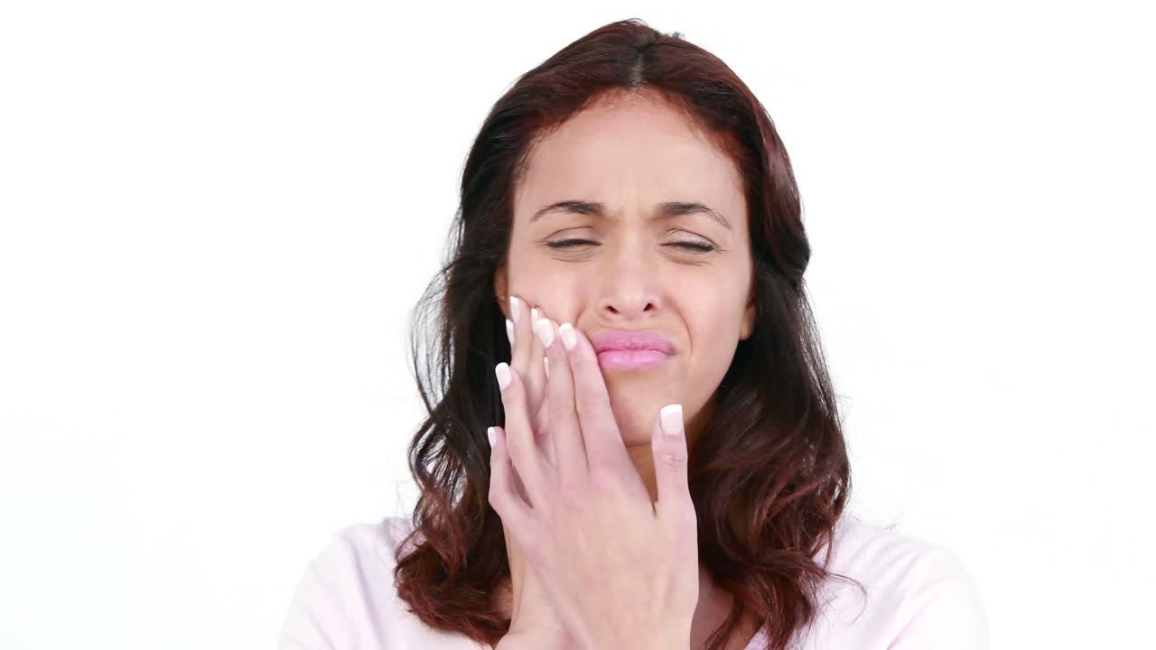 Upset woman with a toothache