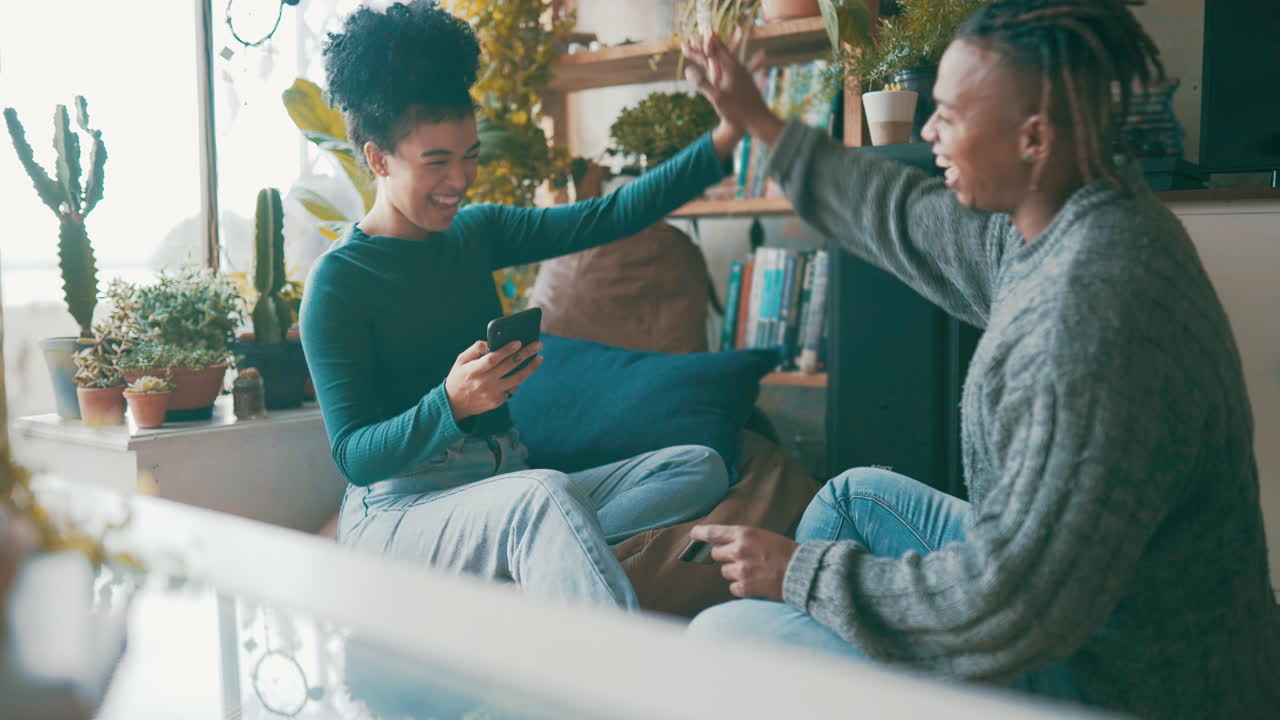 a couple holding a bank card