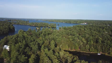 crane drone view of a remote cottage lake