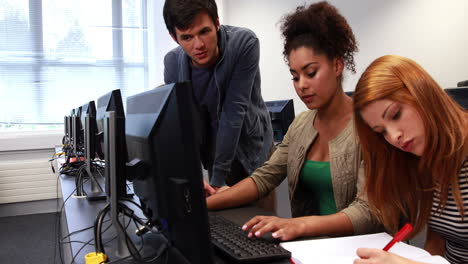 students working together in computer room