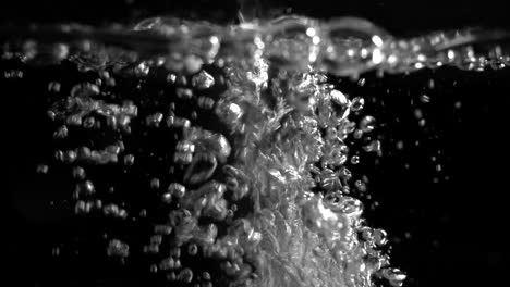 fresh clean drinkable water filmed on black background