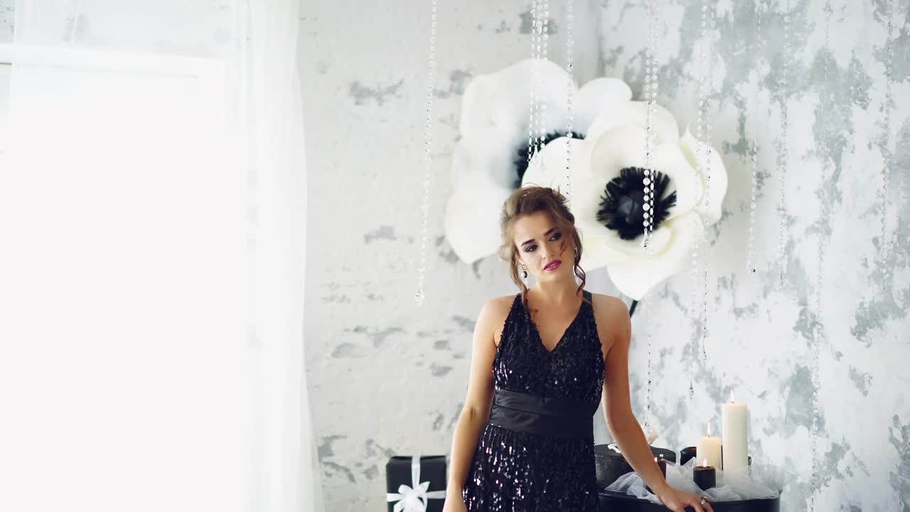 Brunette woman in luxury home interior. Beauty young brunette woman in luxury home interior