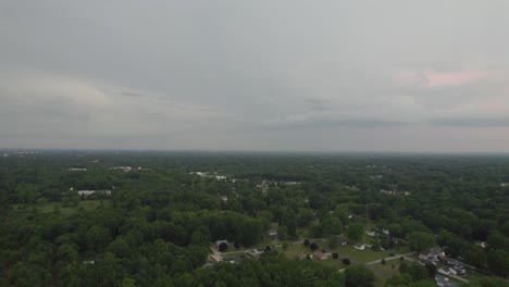 aerial view of a small town in countryside at sunset time