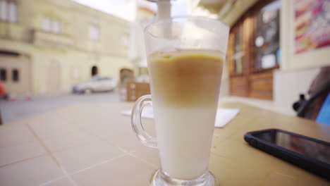 Sipping-frothy-milk-coffee-vacationing-Malta-pov-gopro