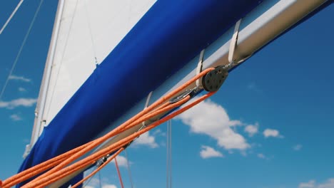 Sail-And-A-Piece-Of-Rigging-Yacht-Against-The-Blue-Sky