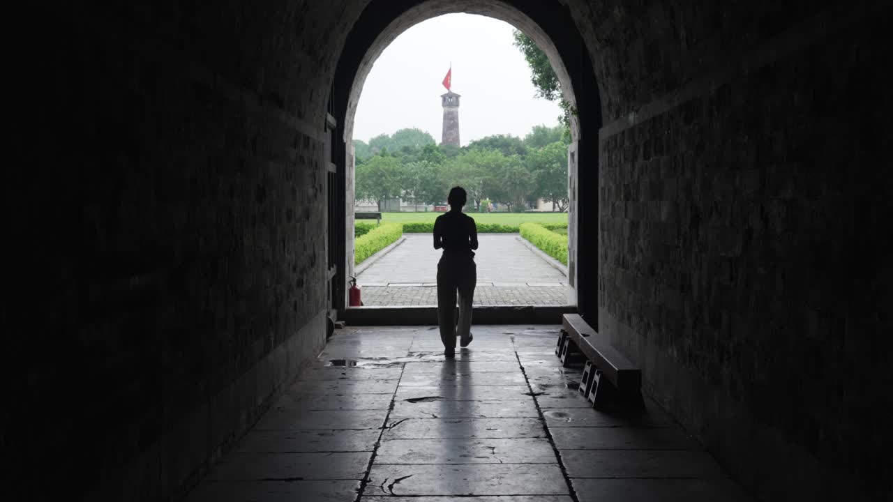 Entrance gate of Thang Long Imperial Citadel Hanoi Vietnam tower Vietnamese national flag