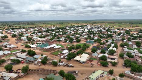 Forward-drone-view-of-countryside-in-Africa's-Sahel-region-on-cloudy-day