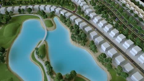 model of residential development with golf course and lake