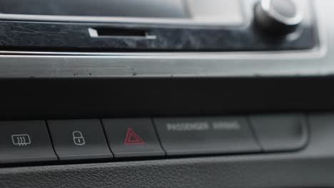 Press-lock-door-button-on-car-front-panel