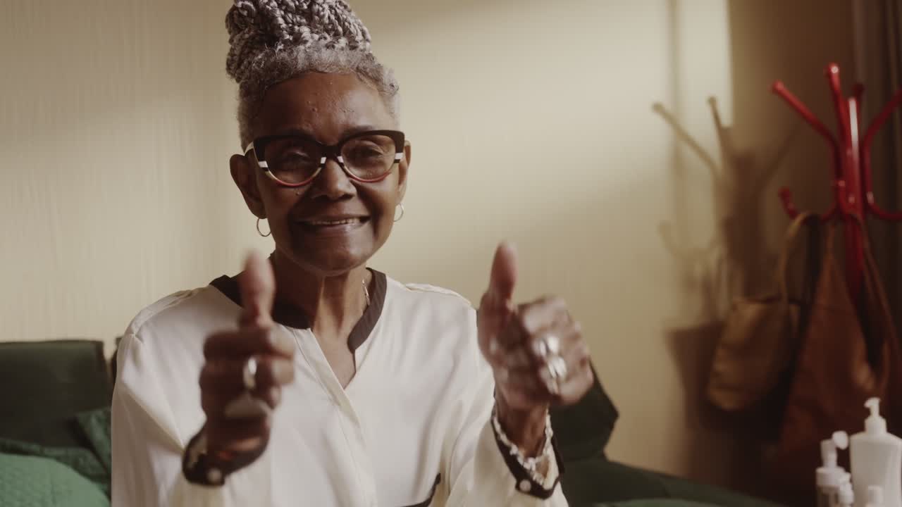 Elderly African American Woman Giving Thumbs Up