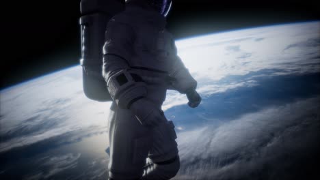 astronauta en el espacio exterior con el telón de fondo del planeta tierra. imagen de la tierra proporcionada por la nasa