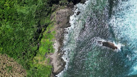 Top-View-Of-Green-Rocky-Mountains-Over-Tropical-Sea-Near-Baras,-Catanduanes,-Philippines