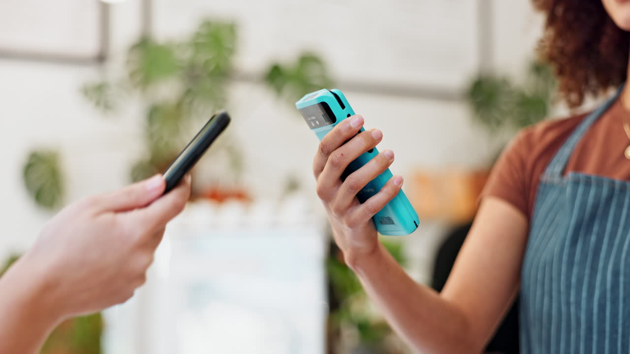 A person paying with a QR code on their mobile phone