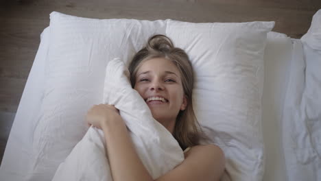 woman enjoying a morning in bed