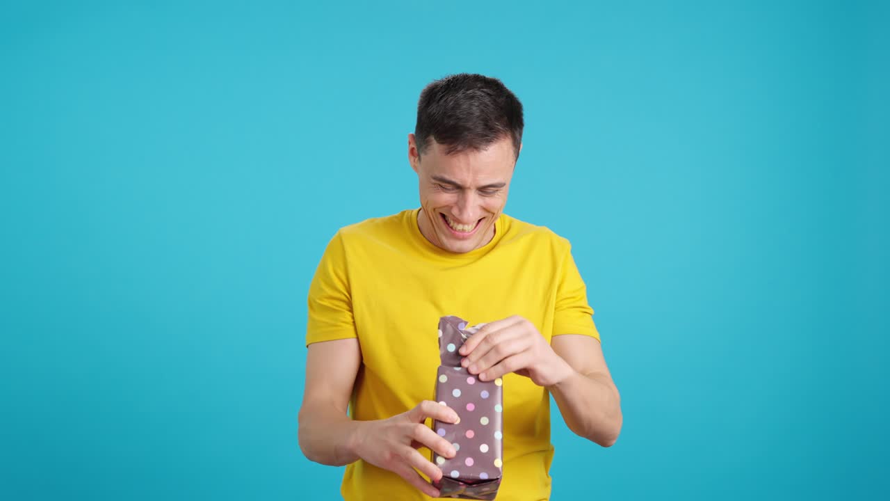 Man opening a gift