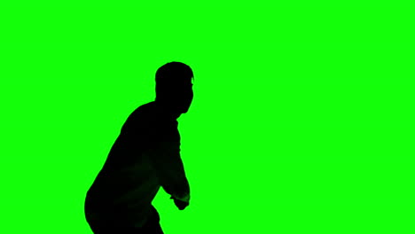 Silhouette-Eines-Mannes,-Der-Tennis-Auf-Einem-Greenscreen-Spielt