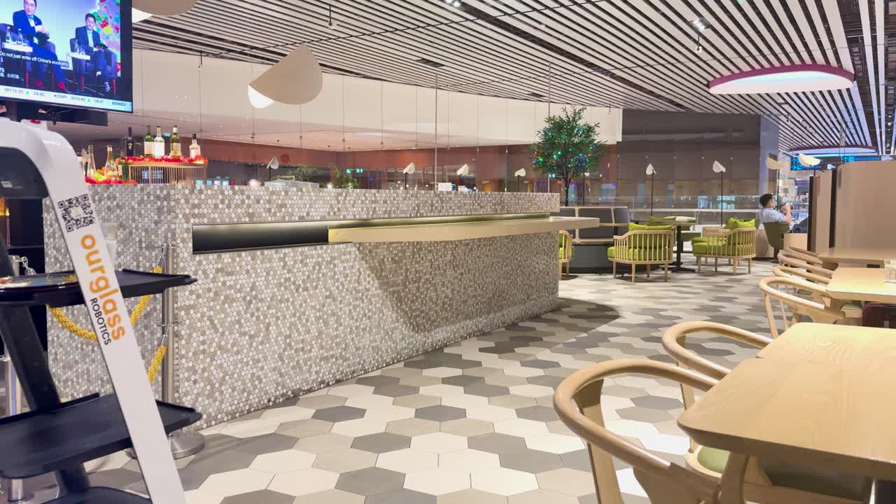 Robot serving drinks at airport bar