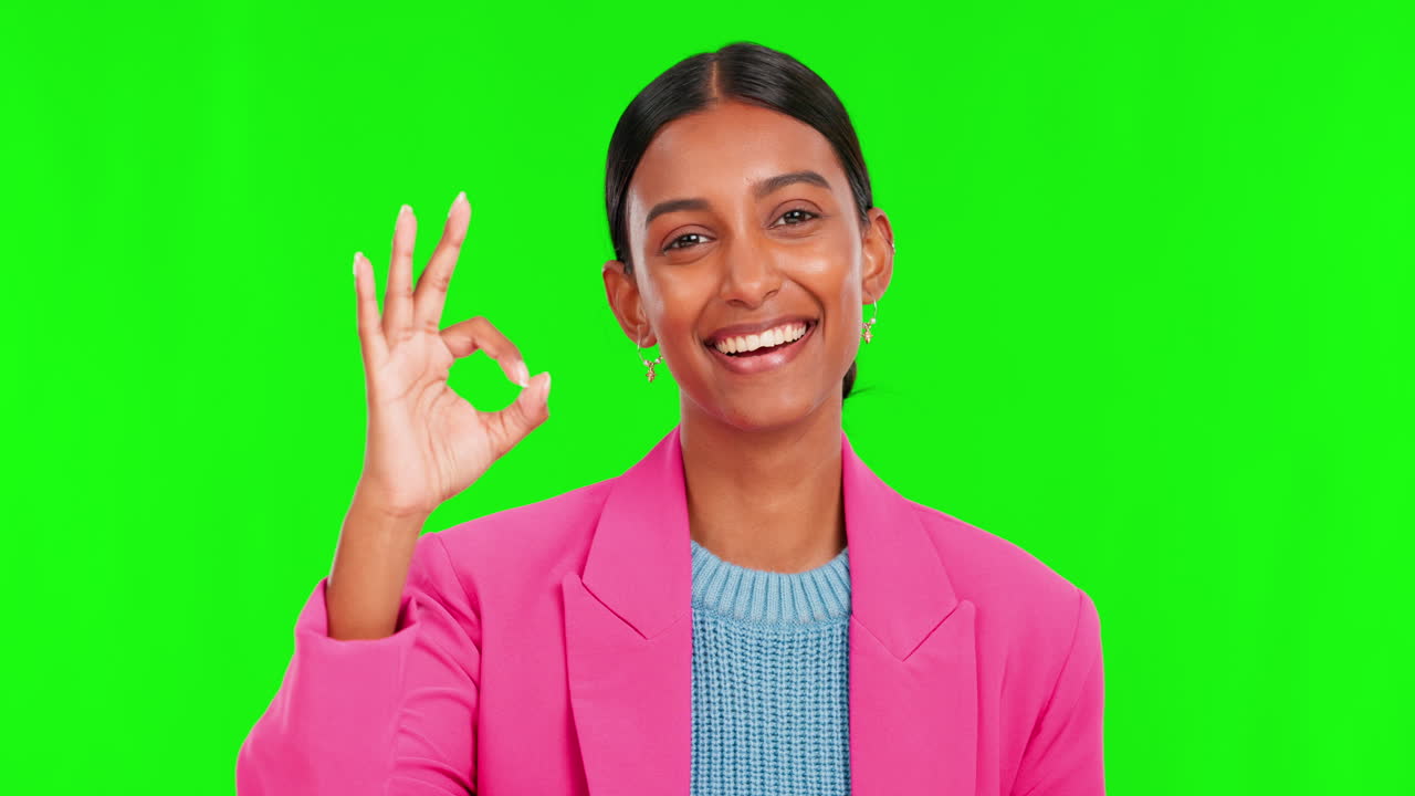 Okay, smile and face of woman on green screen
