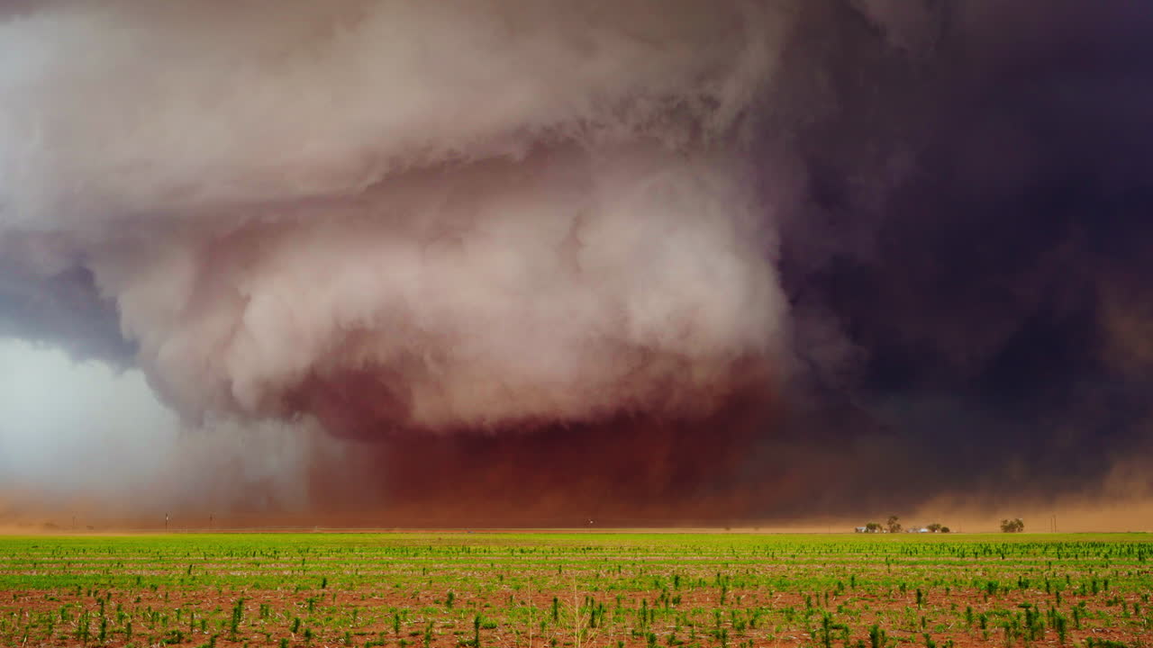 Severe Weather Tornado Spinning Across Wide Rural Landscape