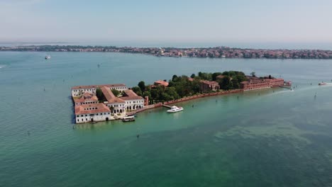 san servolo island seen from drone, showcasing the historic architecture during daylight, spring