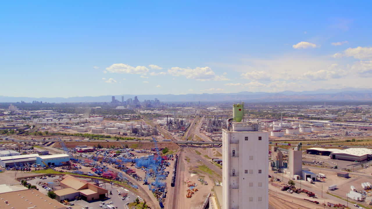 Large Industrial Area in front of Denver Colorado Skyline