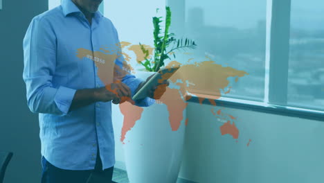 Animation of world map with data processing over biracial businessman using tablet in office