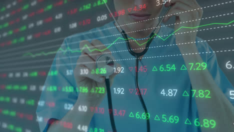 animation of stock market data processing over caucasian male health worker holding stethoscope