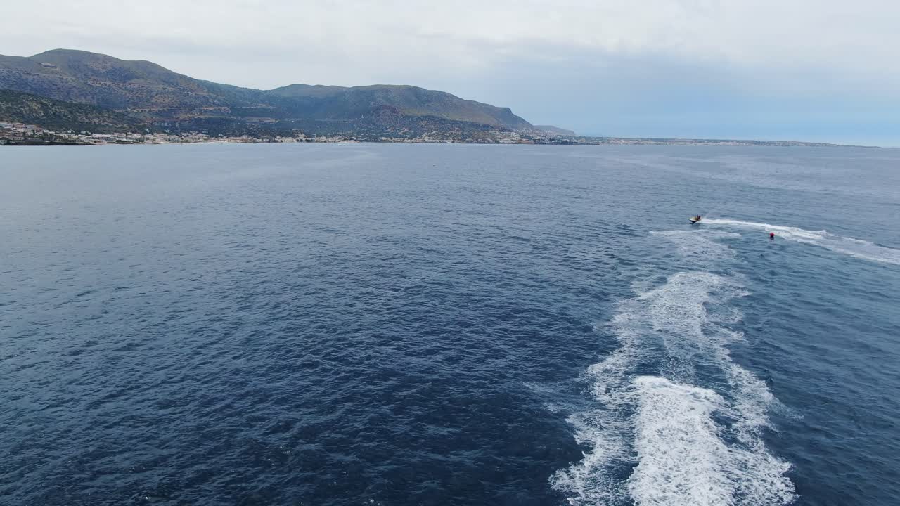 jet ski racing on a crystal clear waters of the Mediterranean sea of Crete