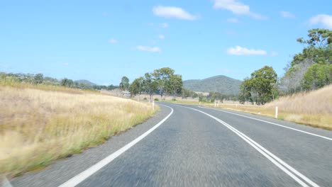 Car-Point-Of-View-Driving-On-Sealed-Roads-In-Australia,-Road-Trip-in-Queensland