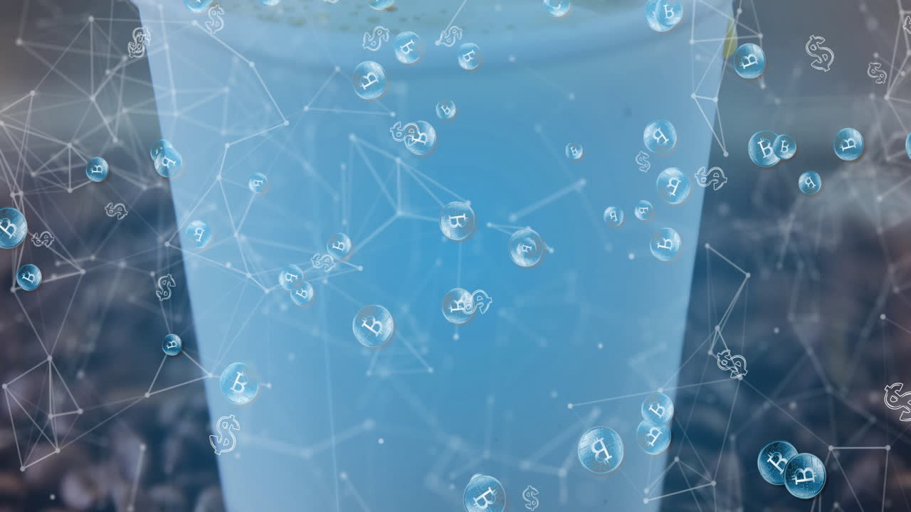 Large light-blue cup showing floating cryptocurrency bubbles and network nodes in conceptual scene