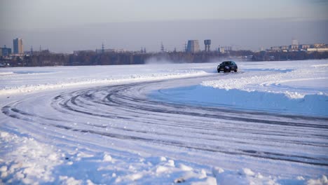 car driving on a frozen snow track