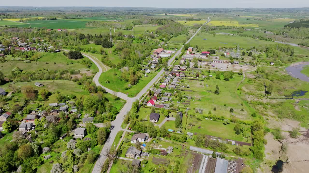 Peaceful aerial view of Kandava Latvia showing main street, rural surroundings