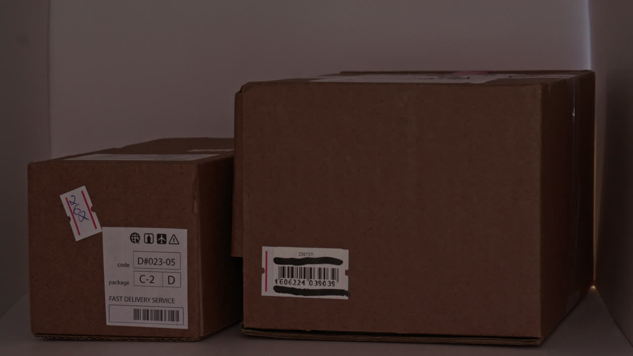 Close Up of Black Woman Picking Up Parcels from Outdoor Mailbox