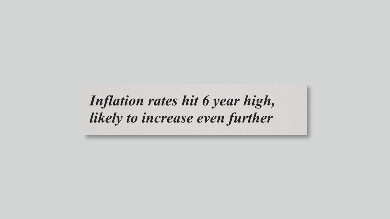 Newspaper Headline About Inflation Economic Pressure and Rising Costs