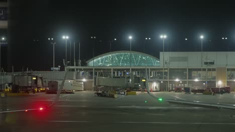 chicago o'hare at night: illuminated terminal and tarmac