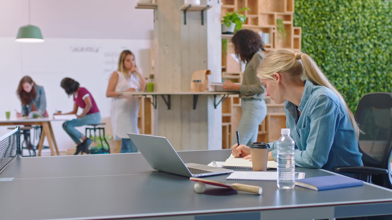 Creative workspace with woman planning