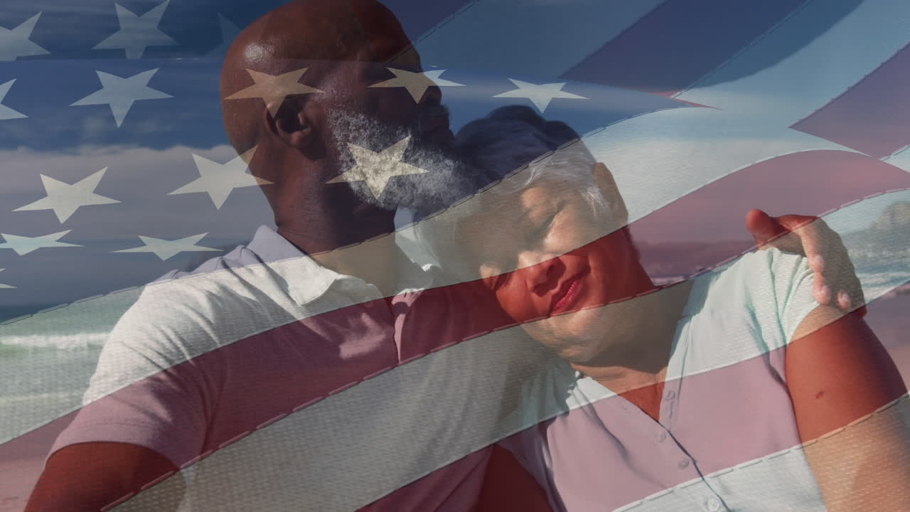 해변에서 포옹하는 사랑에 빠진 행복한 시니어 혼인 커플에 대한 미국 발의 애니메이션