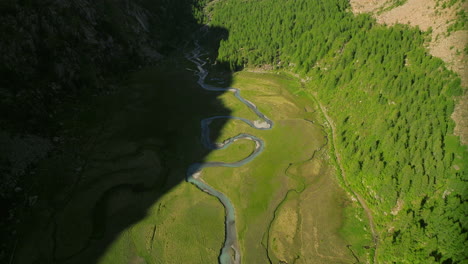 aerial drone view of predarossa or preda rossa valley during summer season in val masino, italy