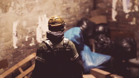 worker in safety gear observing cluttered storage area at night