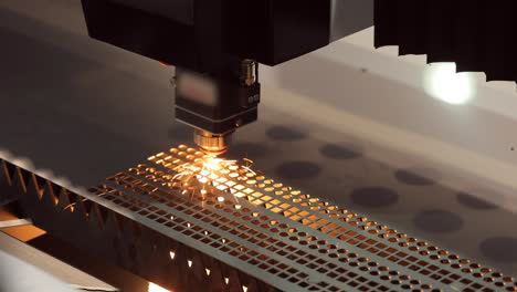 CNC-Laser-cutting-of-metal,-modern-industrial-technology.