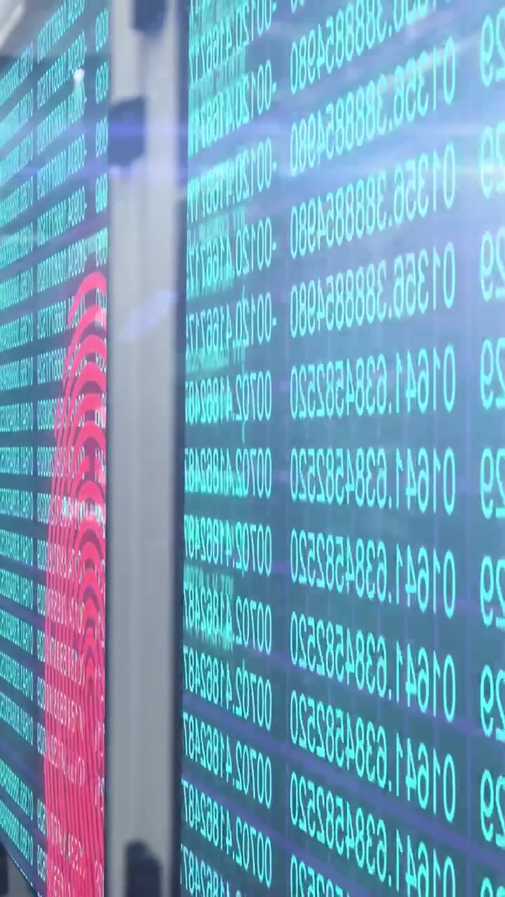 Right display streaming turquoise digits, camera panning, green icon drifting, showing tech data