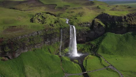 seljalandsfoss waterfalls in iceland with drone video stable