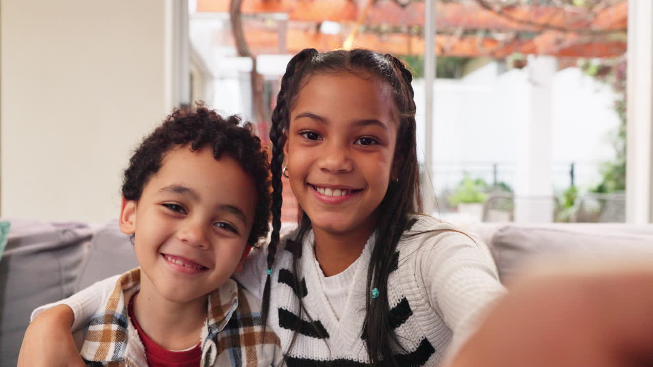 Two happy children taking a selfie