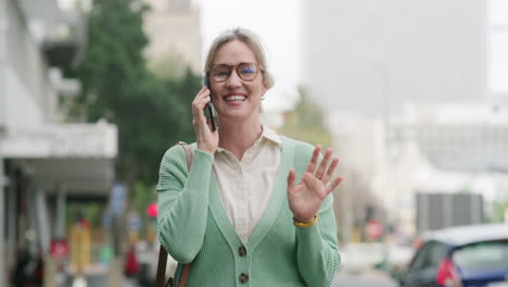 woman talking on phone on city street