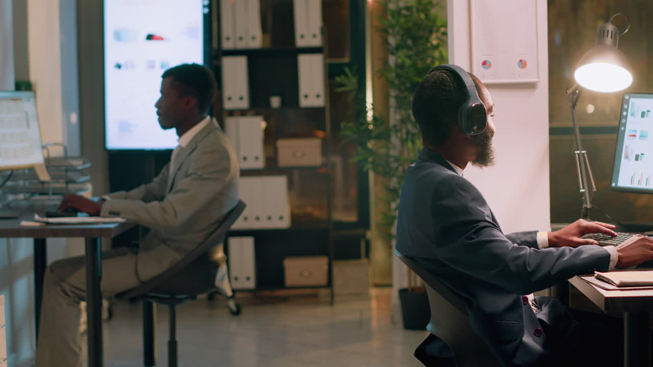 Businessmen working late in the office