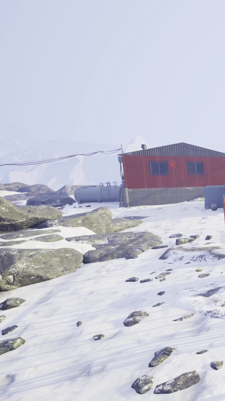 Paisaje nevado con cabaña y terreno rocoso en condiciones de clima frío