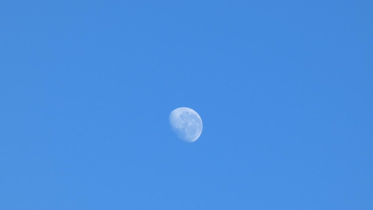 Waning gibbous moon still visible in morning sky - Canterbury, New Zealand