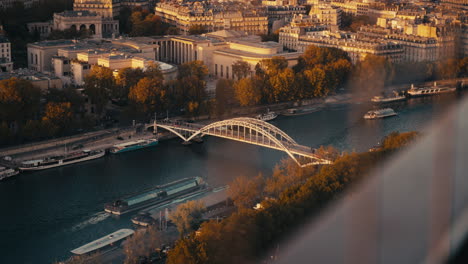 aerial view of the seine river and bridge in paris during autumn