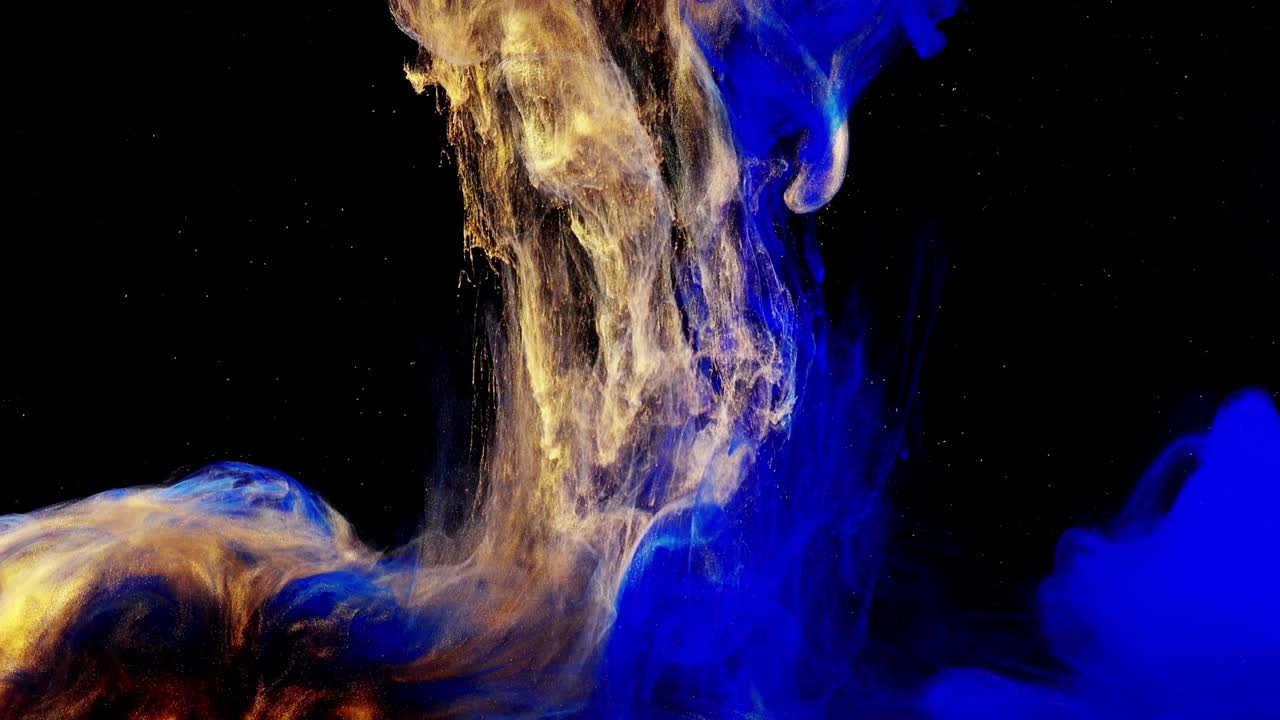 Forme astratte. Riprese su sfondo nero. Mescolanza di colori